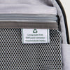 close up of the interior fabric tag on the black travelpro maxlite 5 carry-on rolling tote showing a green recycling symbol and text stating lining made from 100 percent post-consumer recycled plastic bottles.