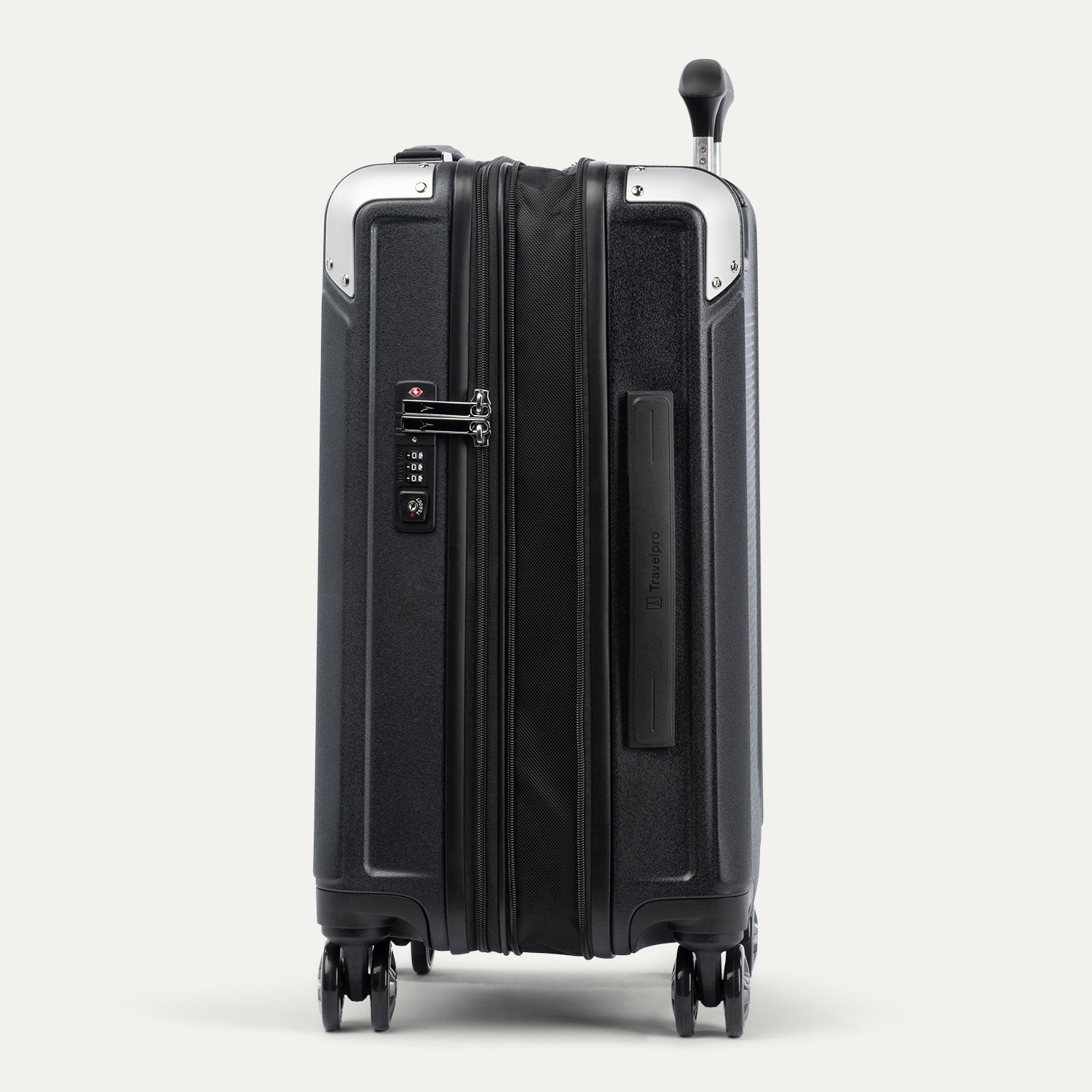 Side view of expanded black suitcase with combination lock on a white background