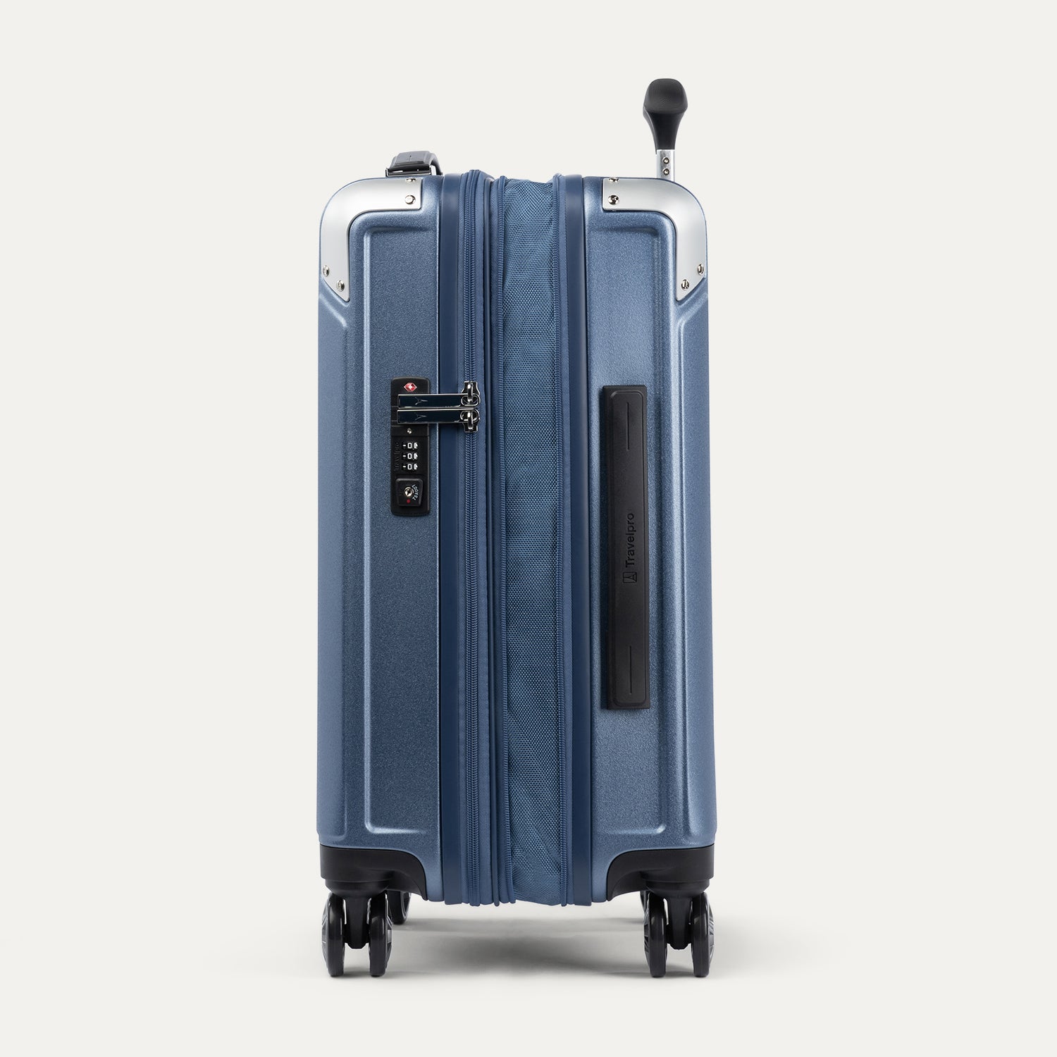 Side view of expanded blue suitcase with combination lock on a white background