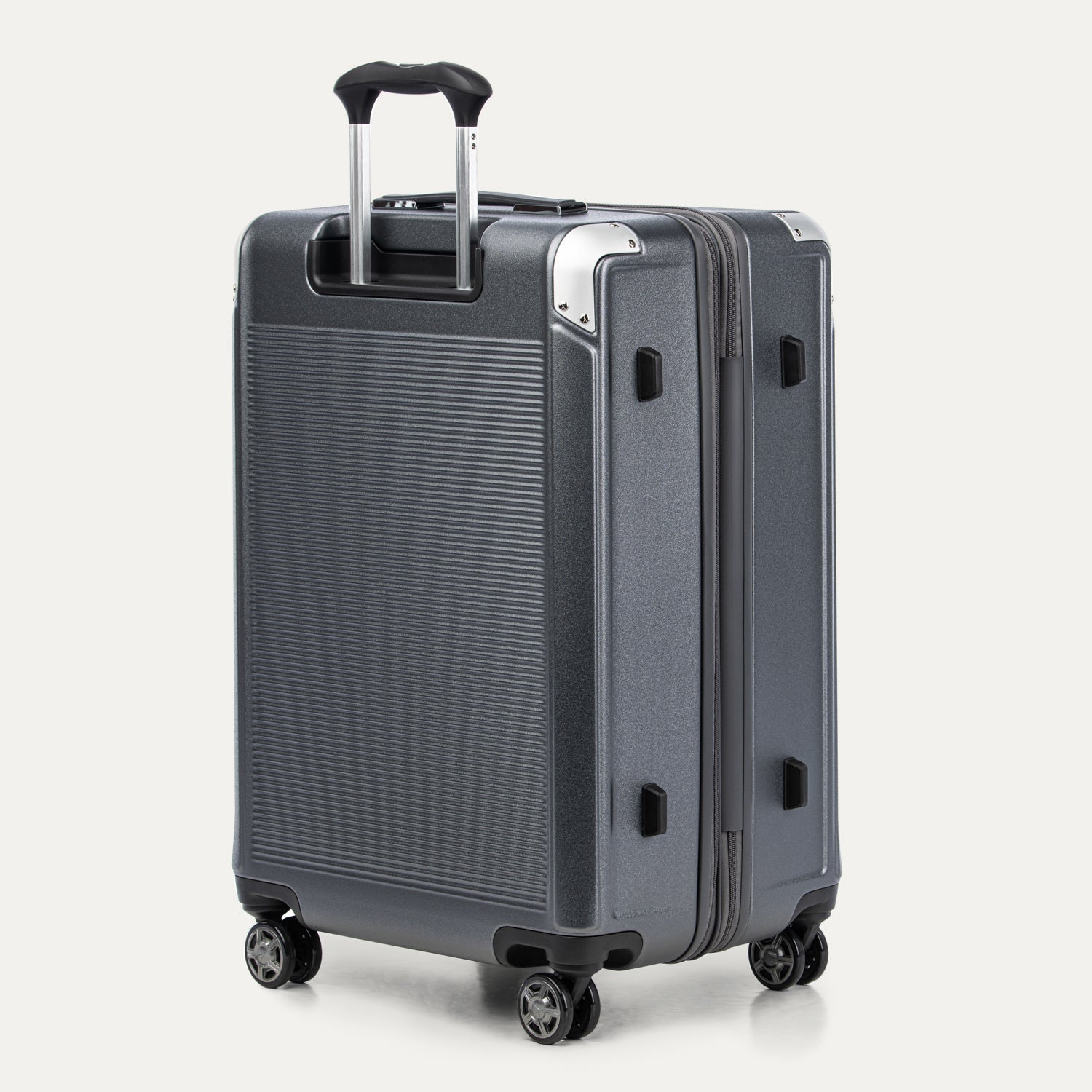 Gray suitcase with black wheels on a white background