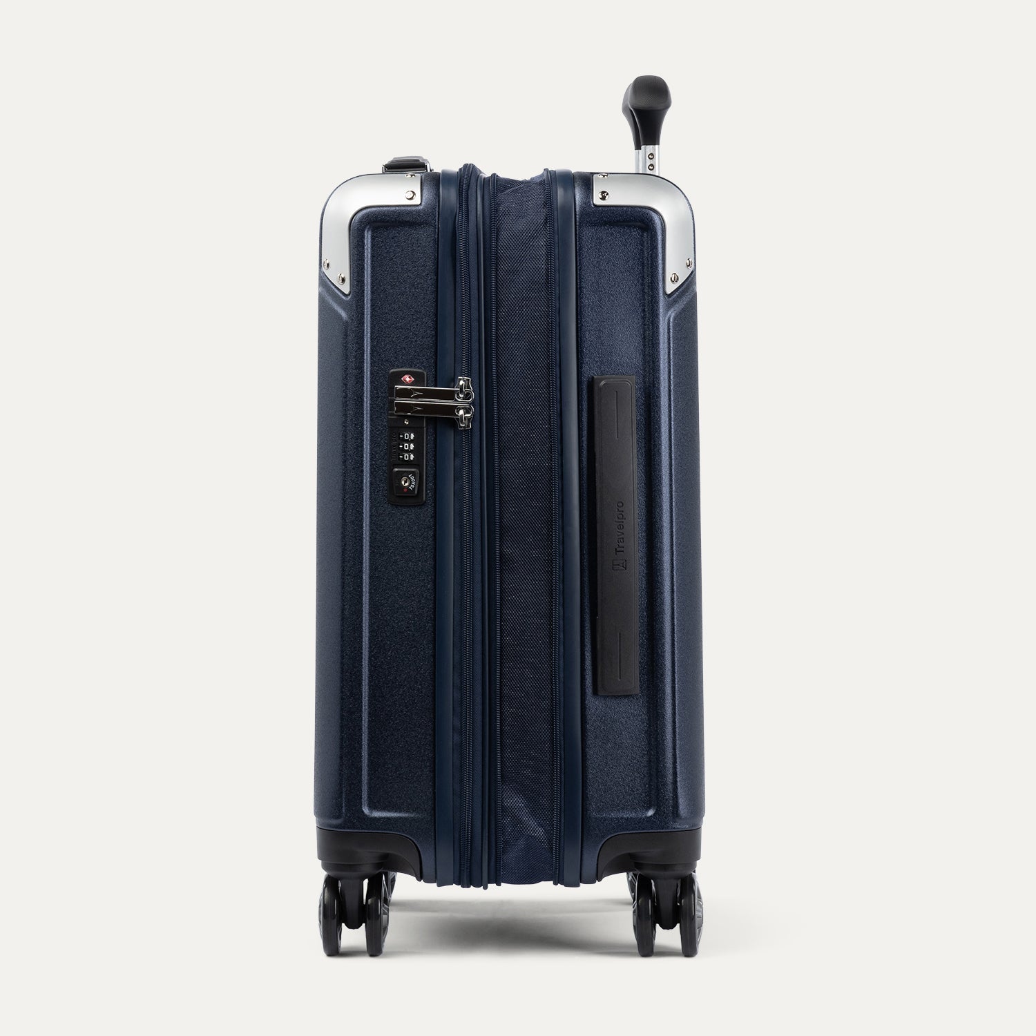 Side view of expanded navy blue suitcase with combination lock on a white background