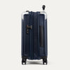 Side view of expanded navy blue suitcase with combination lock on a white background