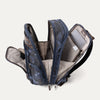 Interior view of Travelpro Platinum Elite Business Backpack in Camouflage, showing padded tech compartments and spacious organization.