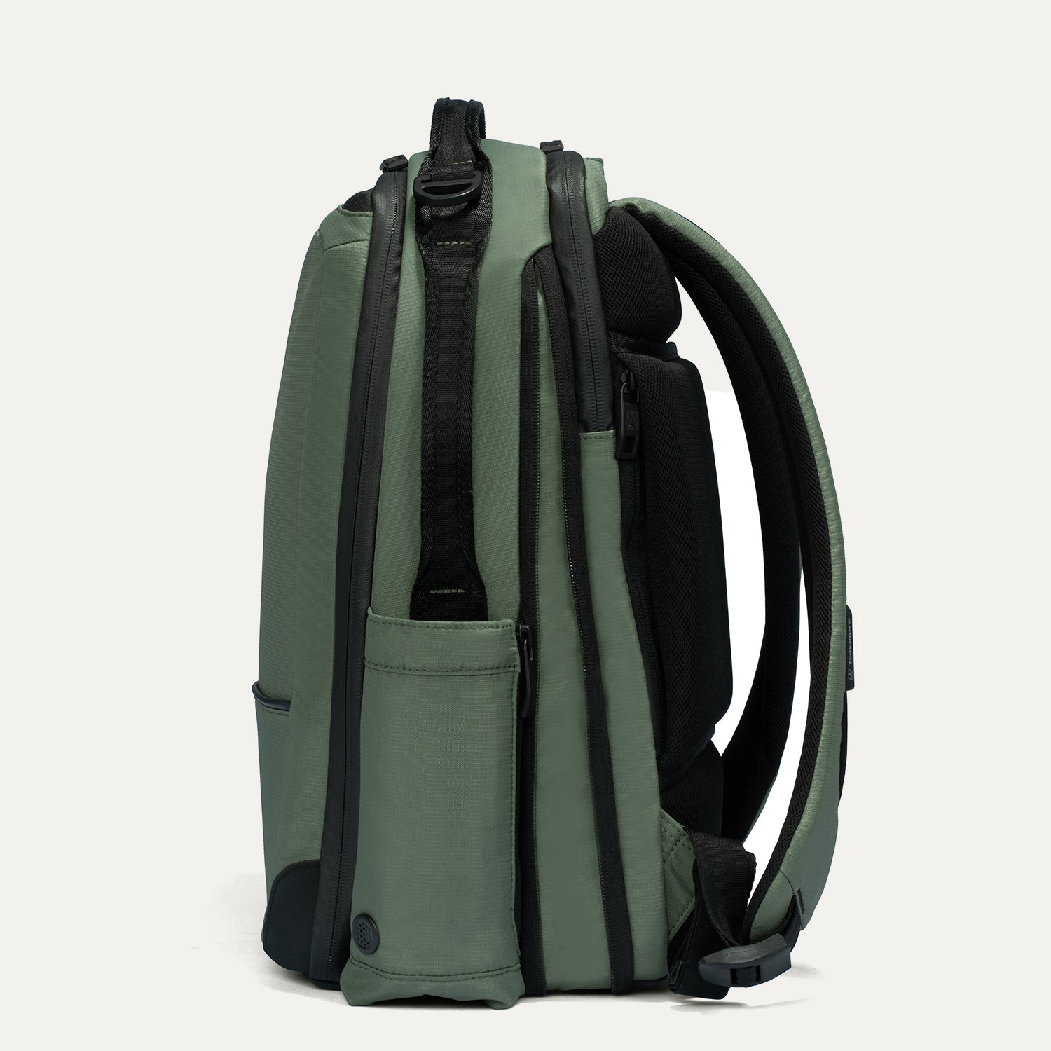 Green backpack with black straps on a white background