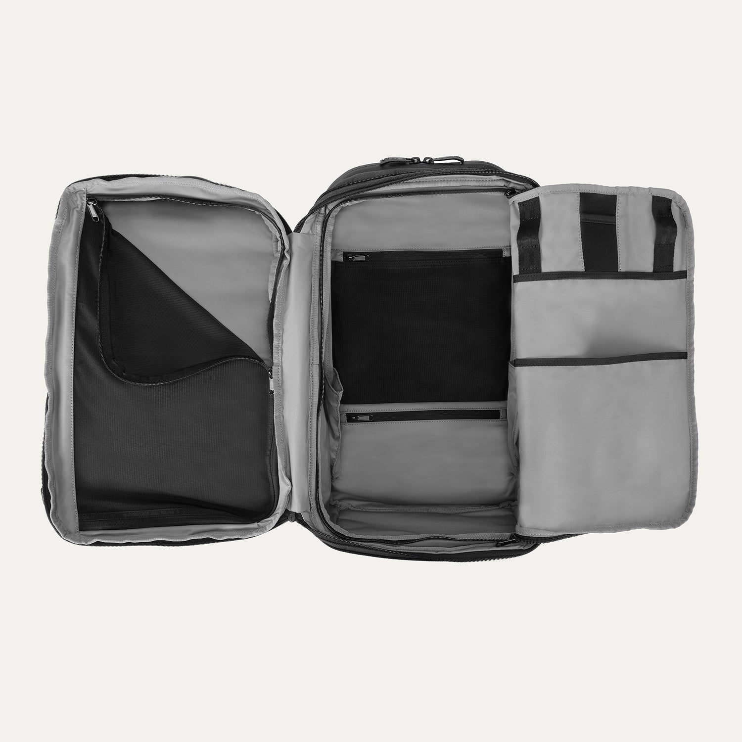 Interior view of Travelpro Altitude All-Purpose Laptop Backpack in Jet Black, featuring multiple compartments and zippered mesh pockets.
