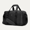 Angled front view of the Travelpro Altitude Day-to-Day Duffel in Jet Black, showing carry handles, D-rings and shoulder strap.