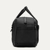 Side view of the Travelpro Altitude Day-to-Day Duffel in Jet Black, featuring an adjustable shoulder strap and side zip pocket.
