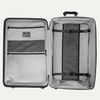 Interior view of the Optima Expandable Large Check-in Spinner in Black, featuring a built-in compression panel, zippered divider, and multiple accessory pockets to help keep packed items organized and secure.