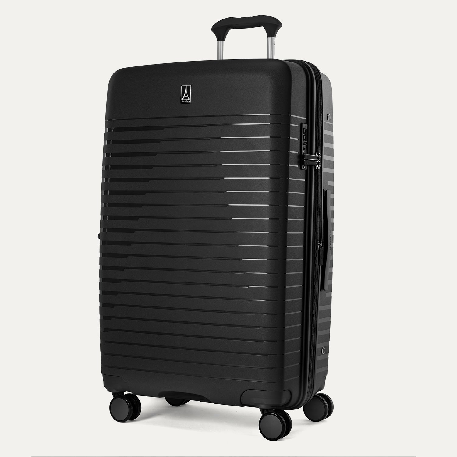 Three-quarter angled view of the Optima Expandable Large Check-in Spinner in Black, showcasing the sleek, ribbed hardside shell, Travelpro branding, and smooth-rolling spinner wheels.